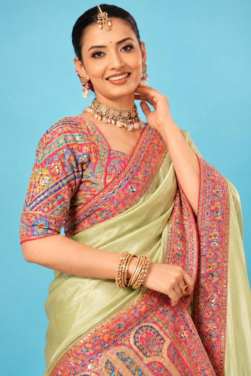 Elegant Pastel Pista Green Designer Saree with Multicolor Paisley Work