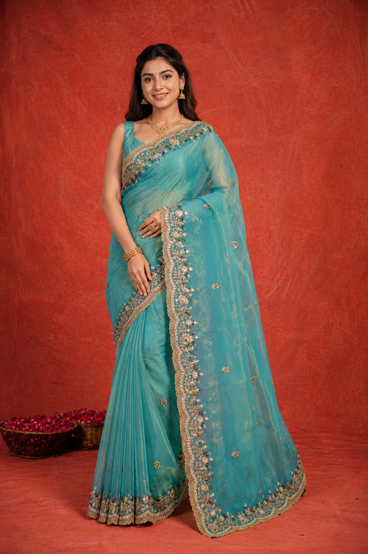 Turquoise Organza Saree with Intricate Zari & Sequin Embroidery