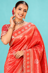Royal Coral Red Designer Saree with Golden Zari Woven Motifs & Rich Traditional Pallu