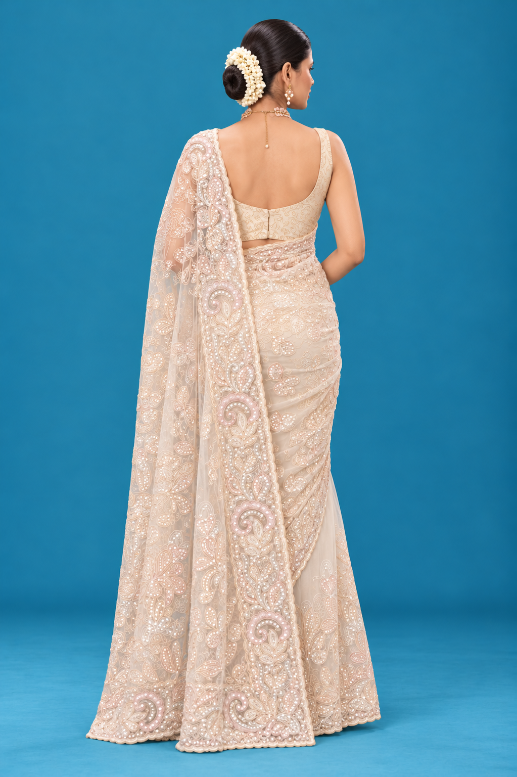Title: Ivory Elegance Embroidered Designer Saree