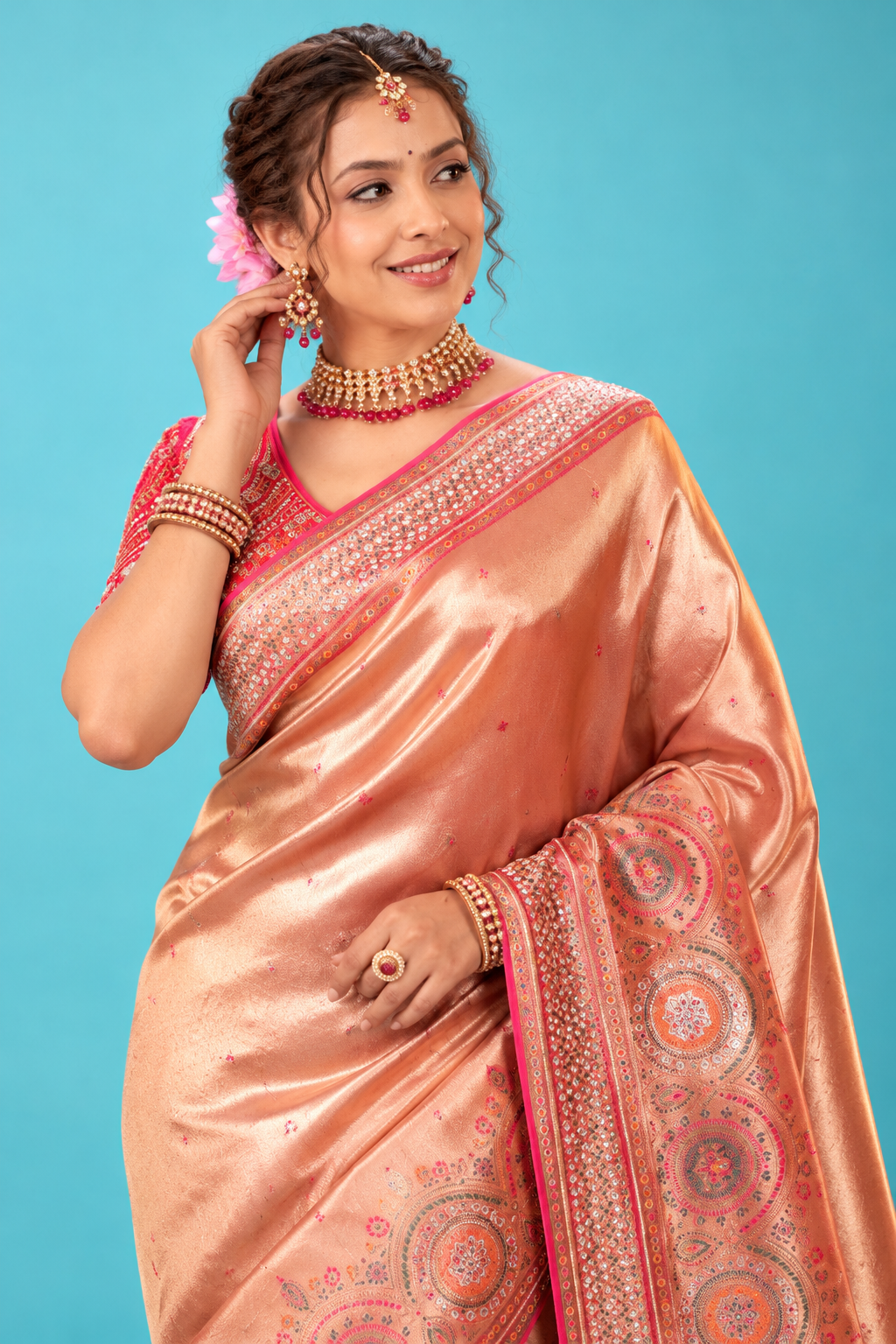 Elegant Peach Gold Designer Saree with Multicolor Embroidered Border
