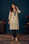 Women's Beige Leaf Printed Straight Kurti with Black Embroidered Yoke