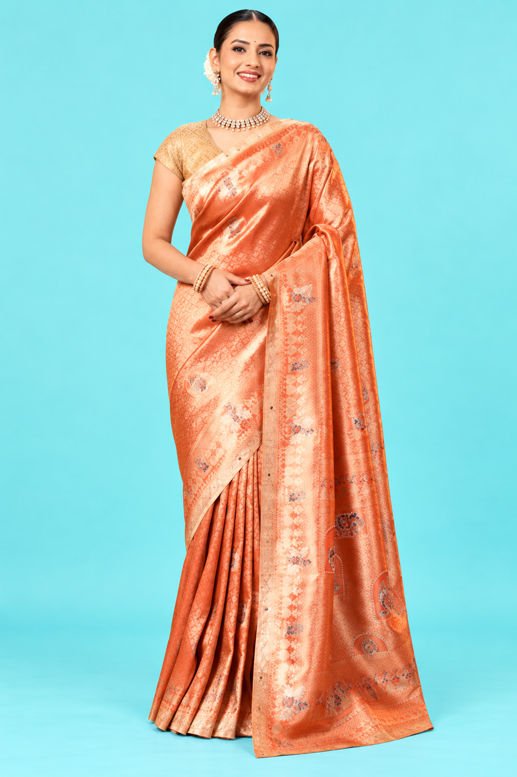 Elegant Peach Orange Designer Saree with Golden Zari Woven Motifs & Rich Traditional Pallu