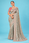 Elegant Sage Green Designer Saree with Heavy Silver Embroidery & Rich Scalloped Border