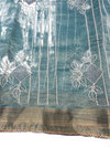 Elegant Teal Linen Saree with Floral Woven Design & Rich Zari Border