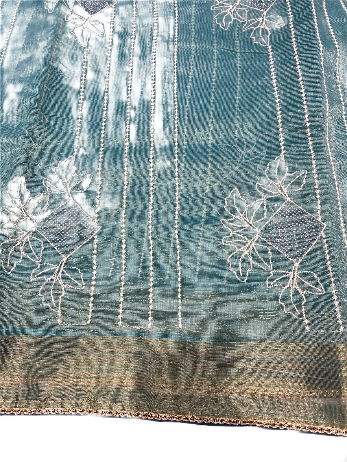 Elegant Teal Linen Saree with Floral Woven Design & Rich Zari Border