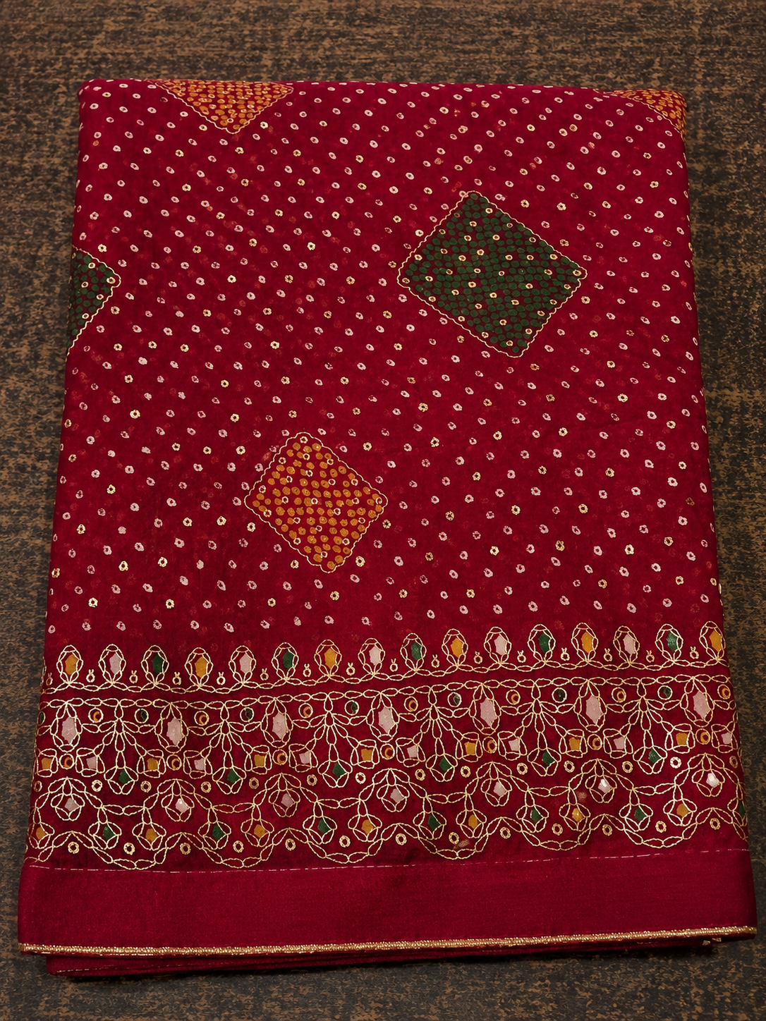 Maroon Bandhani Printed Saree with Elegant Border Design  Description: