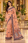 Title: Elegant Peach Saree with Artistic Bird Pallu