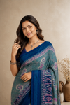 Elegant Teal Blue Printed Saree with Designer Border