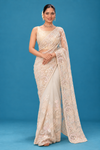 Title: Ivory Elegance Embroidered Designer Saree
