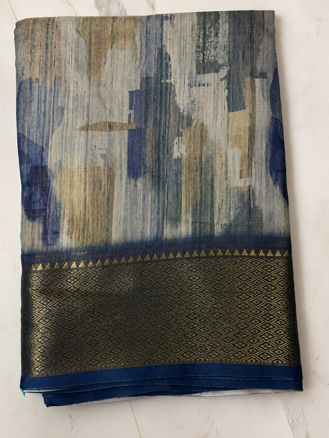 Sky Blue Abstract Print Designer Saree with Elegant Zari Border