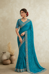 Royal Teal Floral Border Saree – Elegant Ethnic Collection